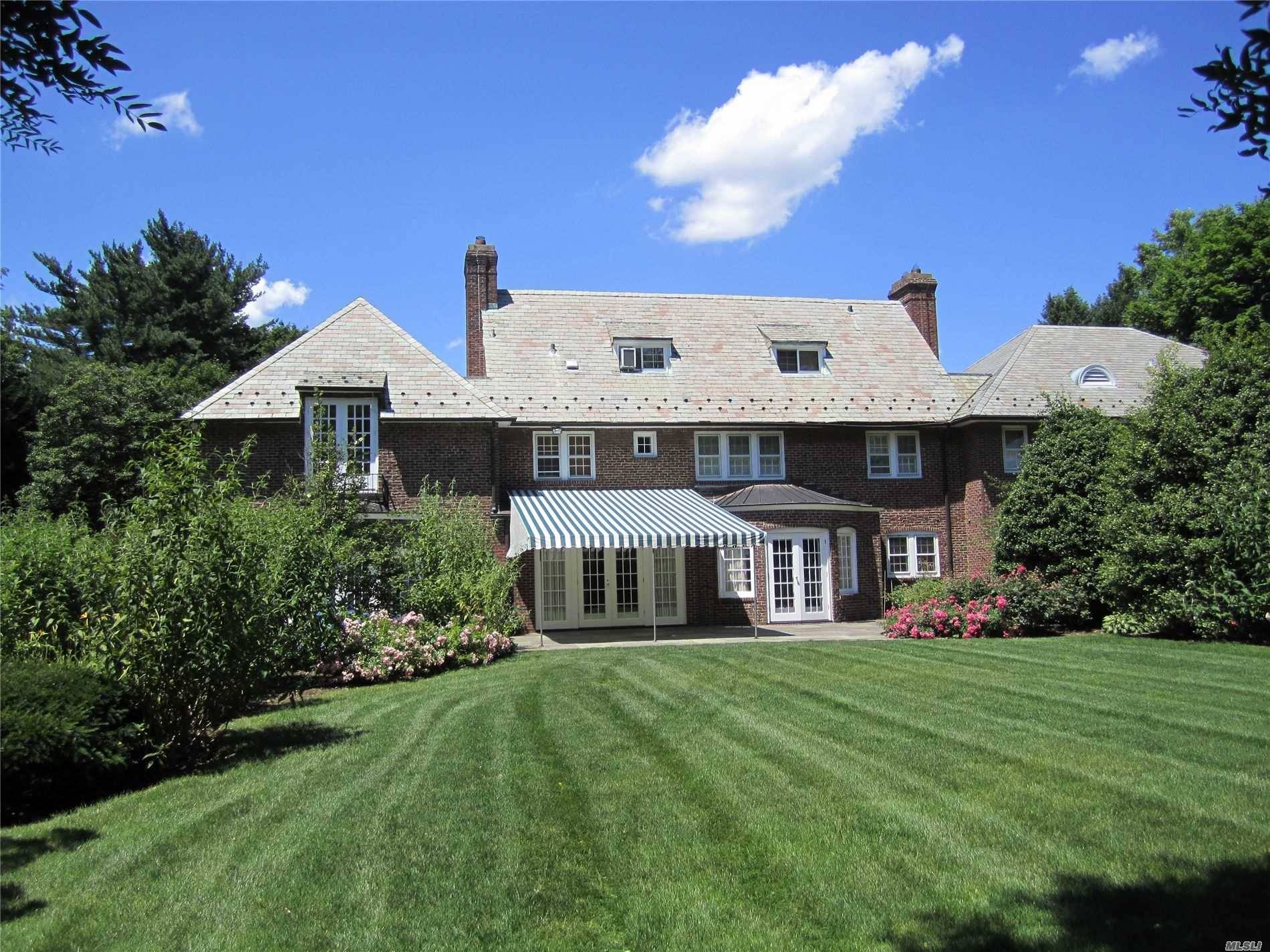 Designed in 1917 by Mott Schmidt this 7 bedroom Estate was originally know as The Farm House.