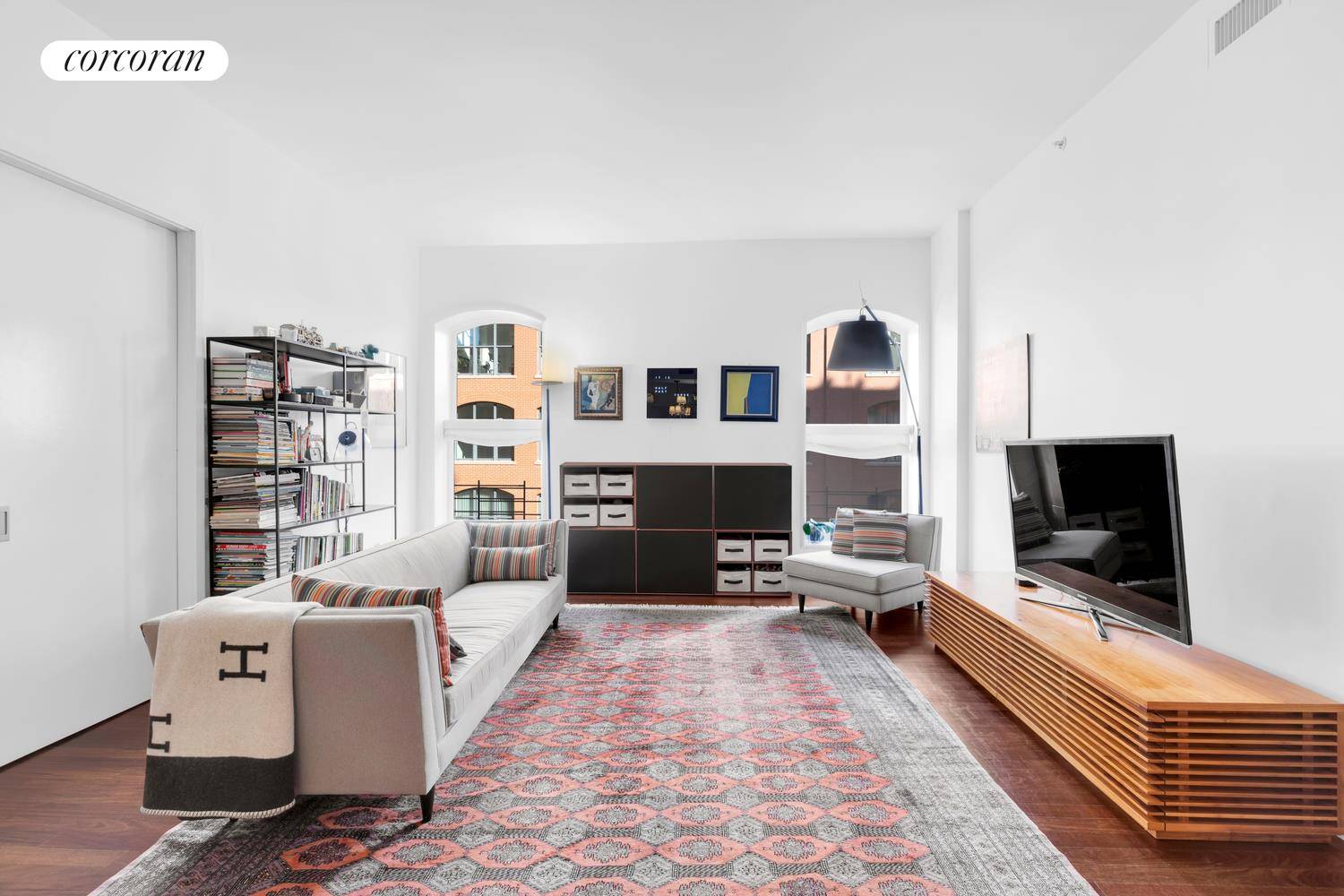 Modern luxury meets pre war charm in residence 4H, a renovated 3 bedroom, 3 bath sun filled loft in one of North TriBeCa's most coveted full service condominiums.