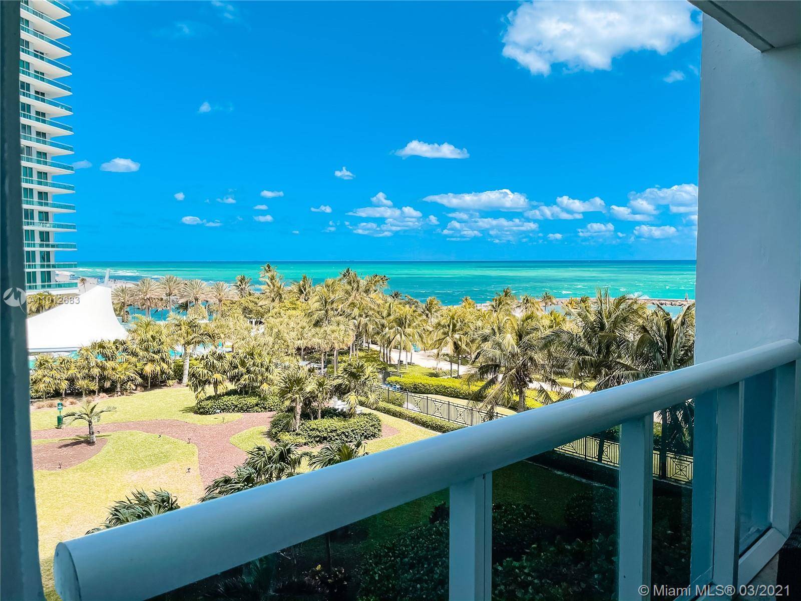 Stunning direct ocean and bay views, rarely available NE view !