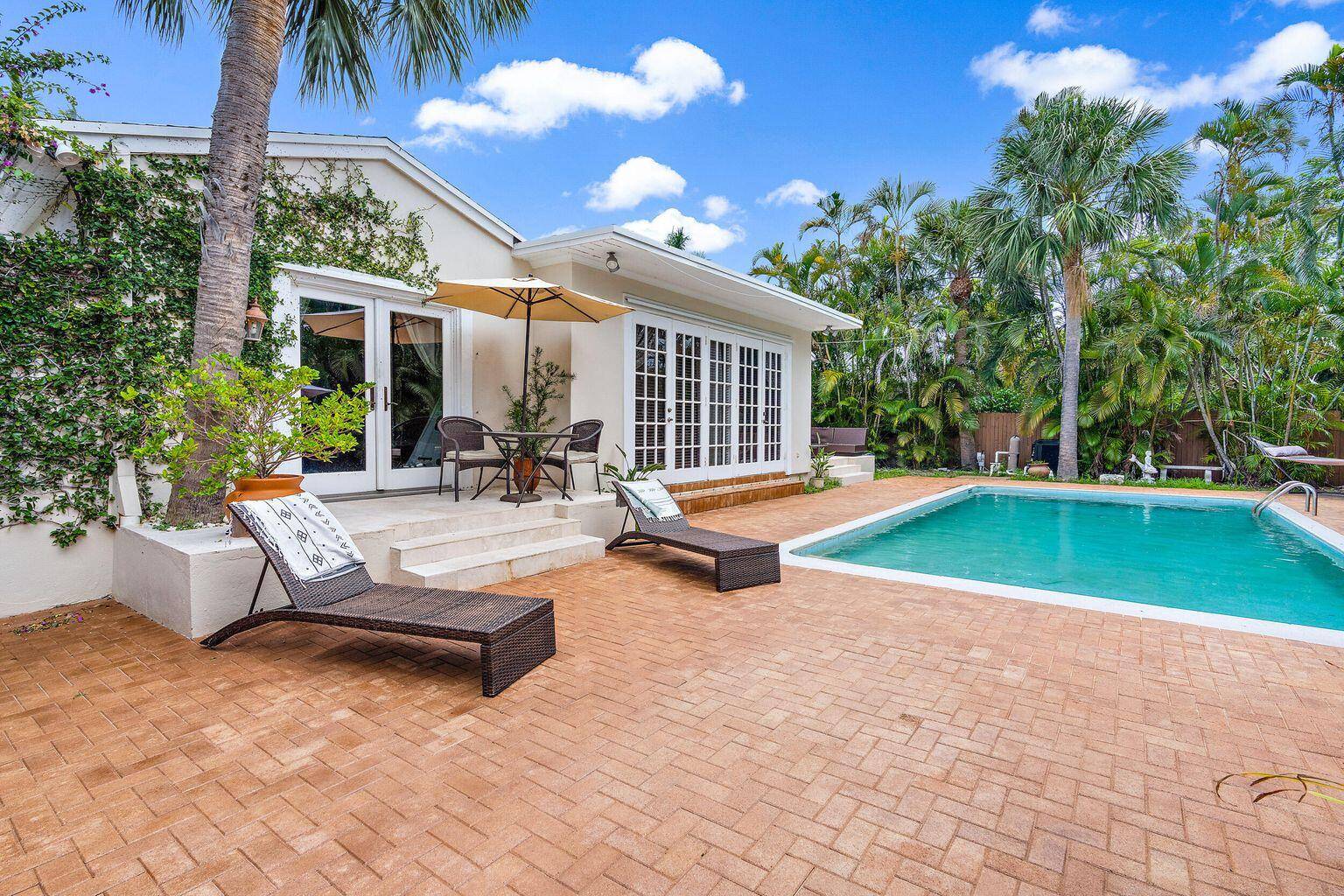 This charming home is situated behind high privacy hedges on one of the most desirable blocks of historic Northwood Shores just a short stroll from Flagler Drive and the Intracoastal ...