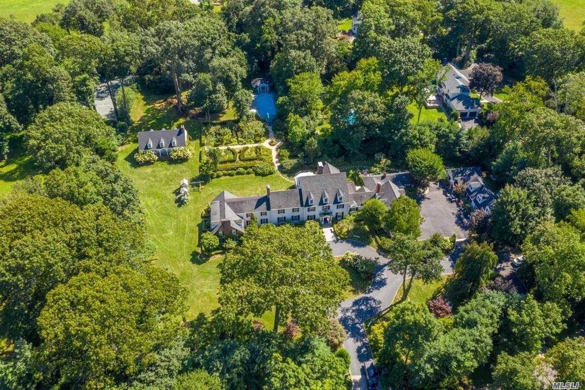 Beautiful private estate featuring 7 bedroom, 8200 sq ft main house, 4 bedroom guest house, heated gunite pool, Har Tru lighted tennis, indoor squash basketball court, 2 ancillary apartments and ...