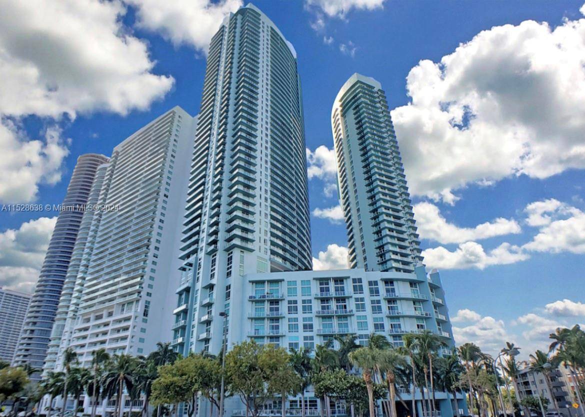 Experience luxury living in this stunning 3 3 Condo with spacious layouts and captivating Bay views.