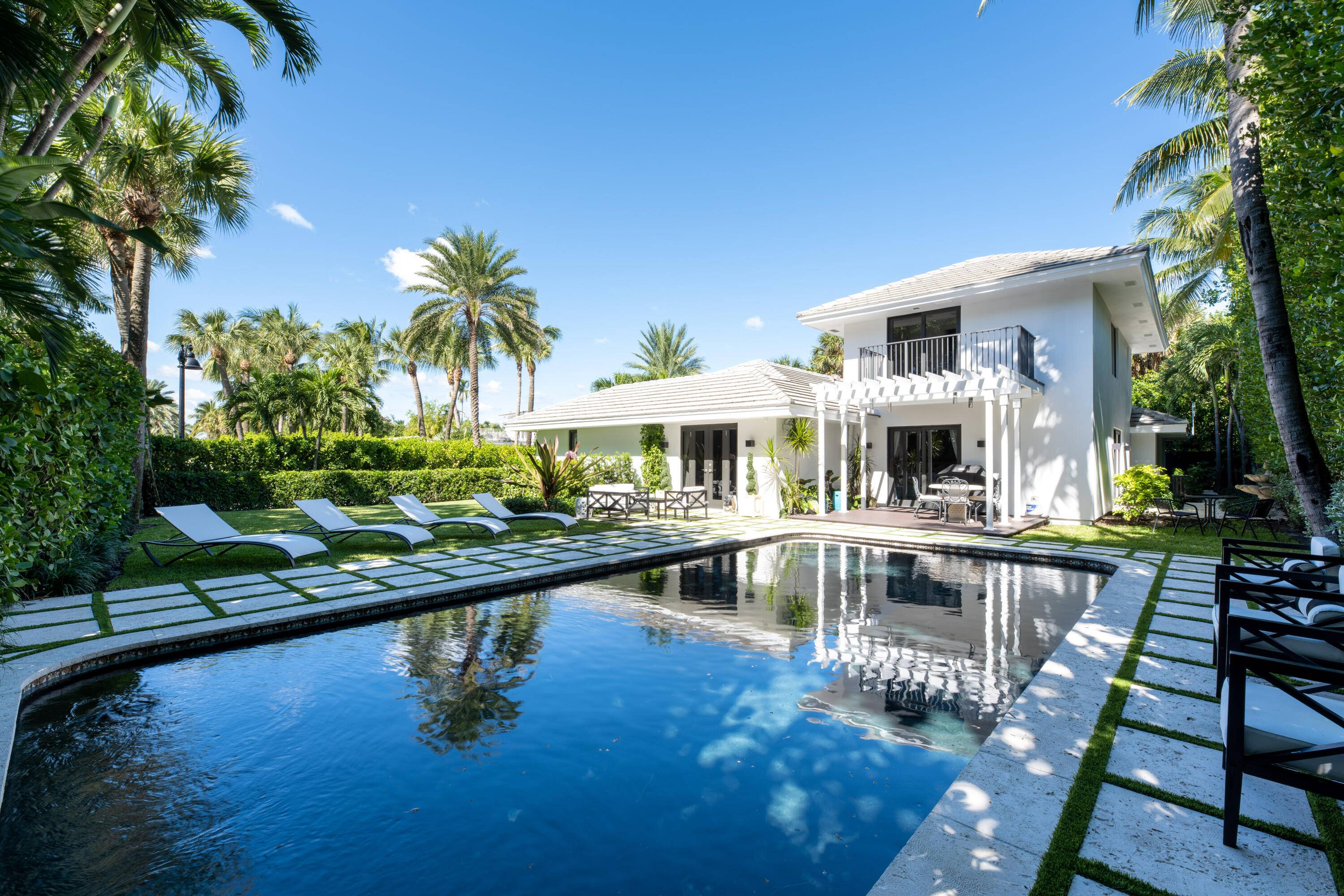 Ideally located on a quiet north end street in Palm Beach, this beautifully renovated home features 3, 803 total square feet with 4 bedrooms, and 4 and one half baths.