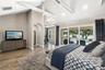 Spacious Primary Bdroom with Flex room, vaulted ceilings with beams and of course a view of the Lake and the Pool!!!!