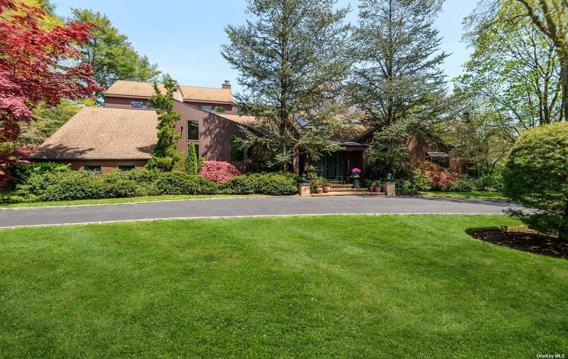 Located on this highly desirable street in the Village of Old Westbury is this entertainers dream home.