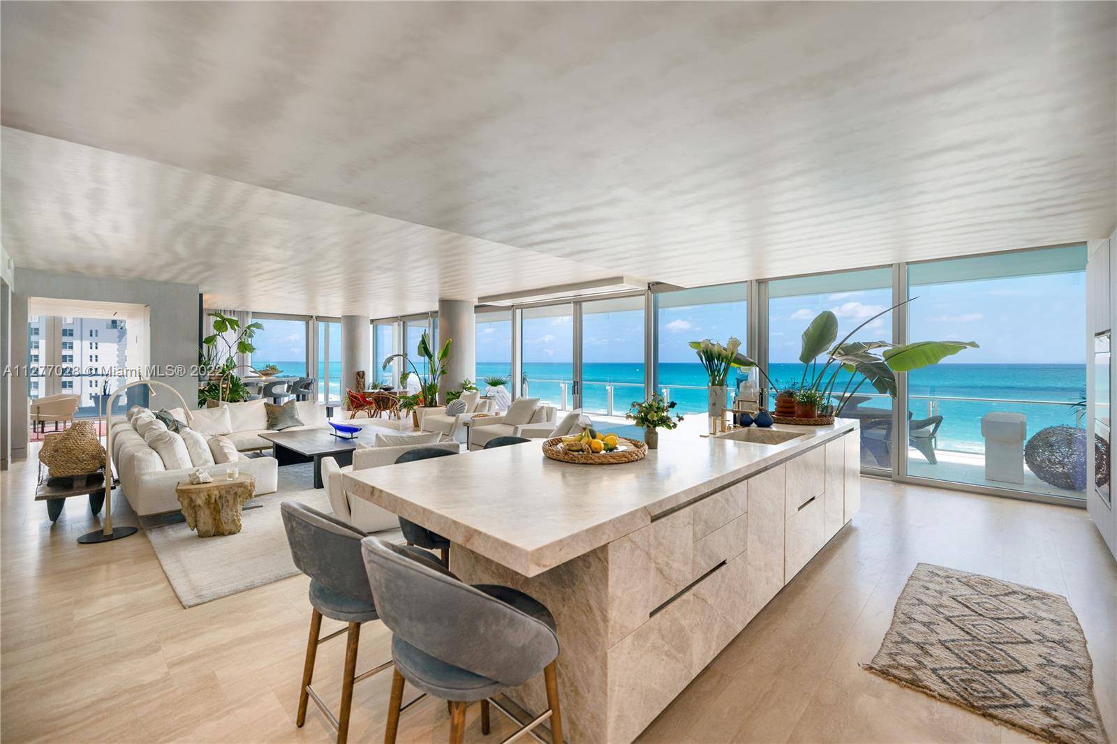 Relish in old world charm of The Surf Club and enjoy state of the art Four Seasons hospitality in this exclusive, rare corner residence with architectural design by Richard Meier ...