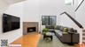 A contemporary fireplace adds