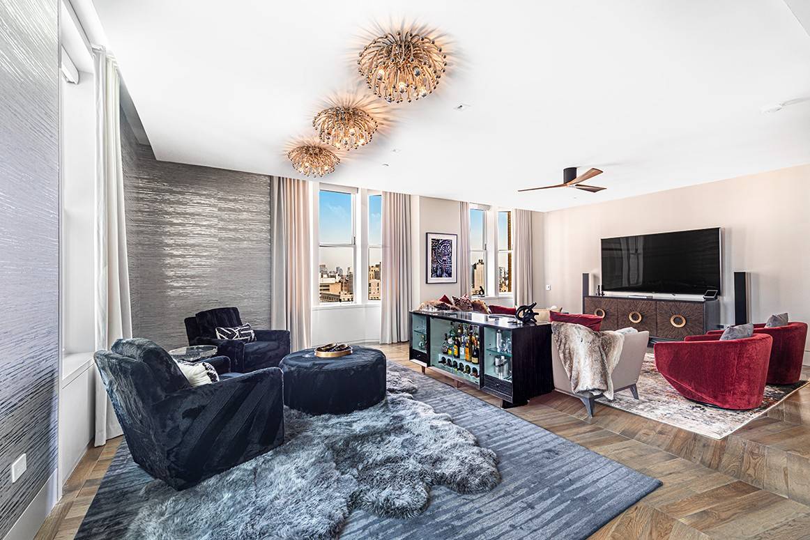 Residence 16E at 49 Chambers Street integrates luxurious modern interiors with classical Beaux Arts architecture in one of the best lofts available downtown.