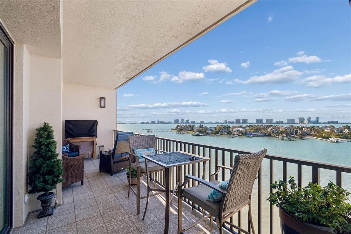 Hurricane Sliding Glass Doors lead to comfy balcony and breath-taking views!