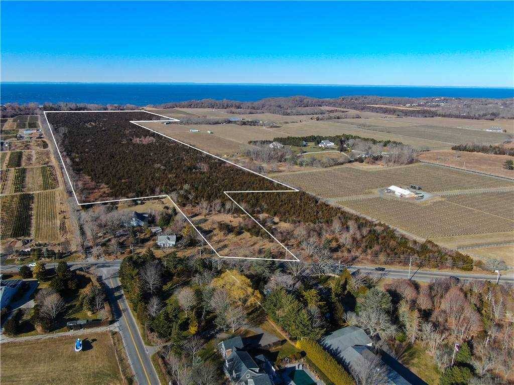 Prime location ! This nearly 70 acre parcel has 4 acres on Sound Avenue with full development rights and 64 acres with development rights sold.