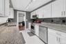 Updated Galley kitchen with view to adjacent family room