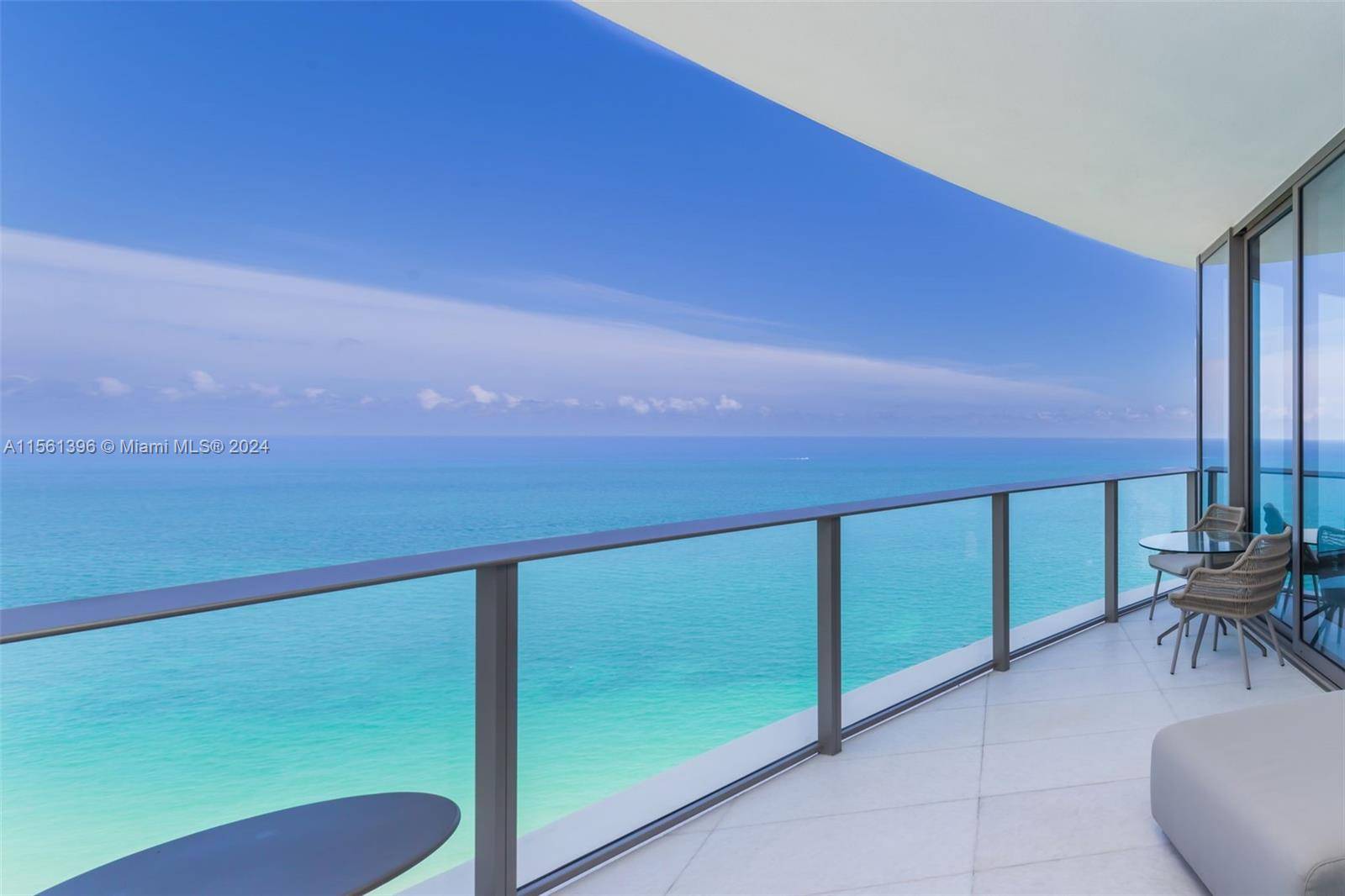 One of a kind Oceanfront Corner Residence with Two Primary Suites, Two Water Facing Terraces, Water Views from nearly every room, including an Ocean Facing Kitchen, and a Private Elevator ...