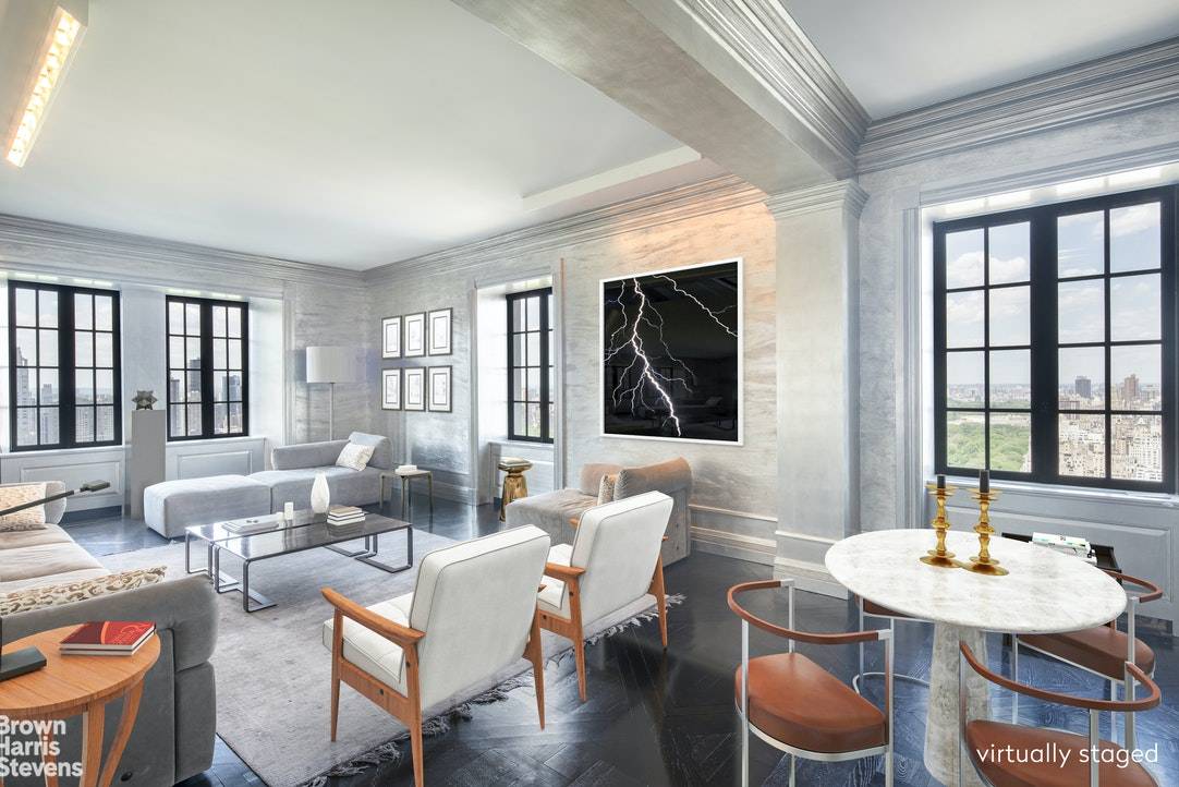 Spectacular, rare high floor corner apartment in the tower with dazzling direct Central Park views from all rooms in the legendary former home of Yves St.