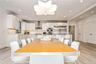 Dining space with light wood-style floors, recessed lighting, and baseboards