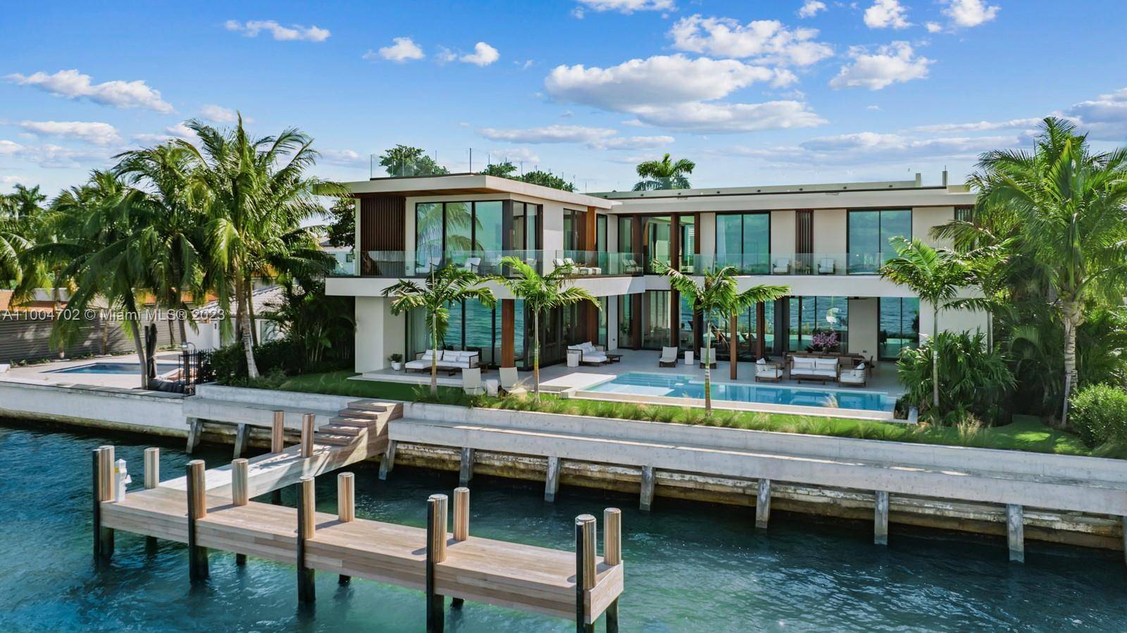 Stunning new construction modern waterfront home situated on oversized 15, 000 SQ FT with over 100 feet of waterfront.