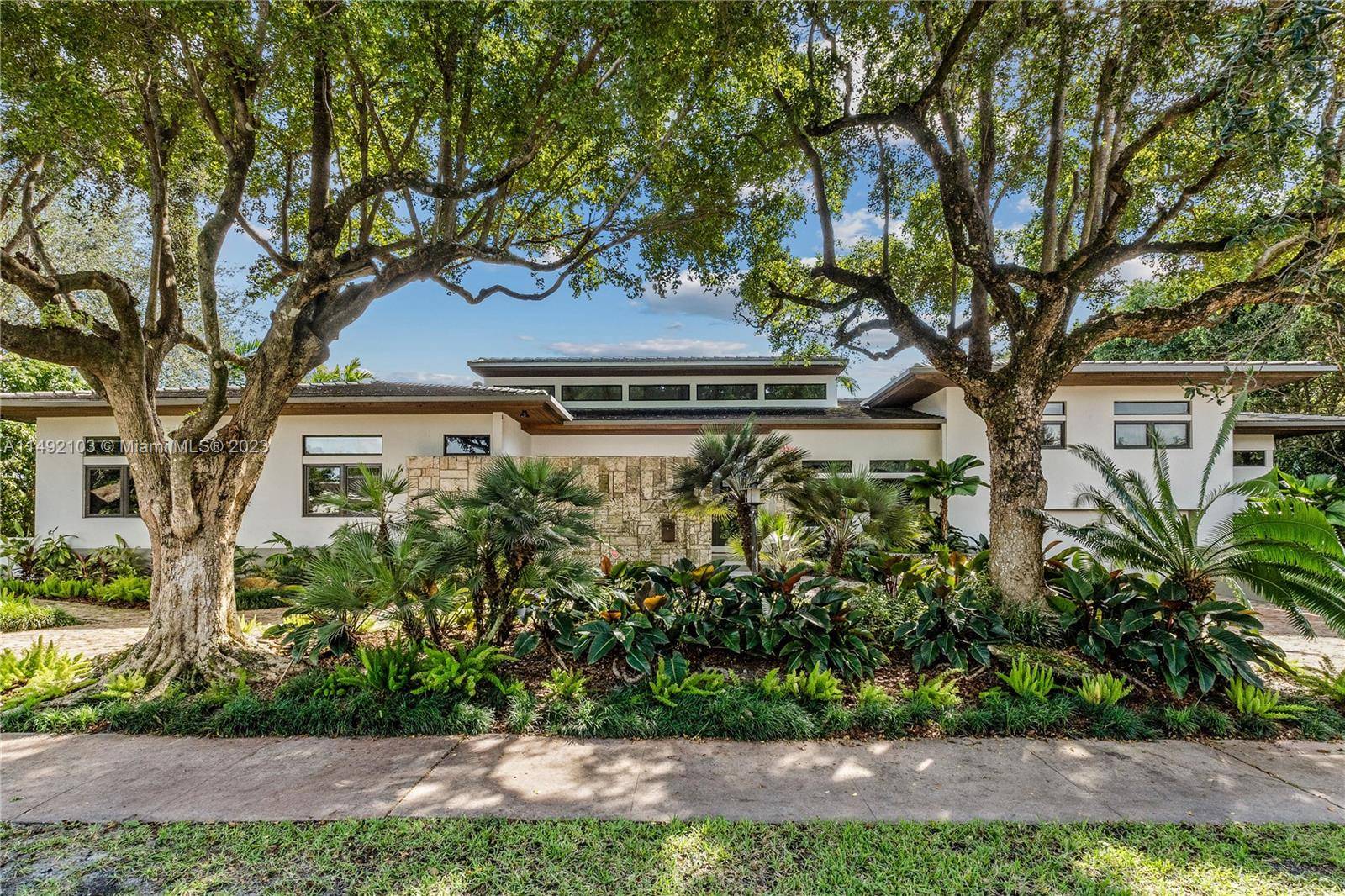 New waterfront custom home with 135 on Gables waterway in Coral Gables.