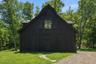 Barn houses a gym, a full kitchen and a private guest suite, a studio/recreation room, and farmequipment storage and workshop.