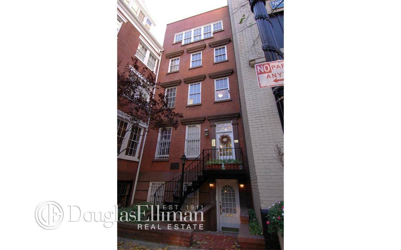 Charming Townhouse Triplex on one of the most beautiful streets in all of New York.