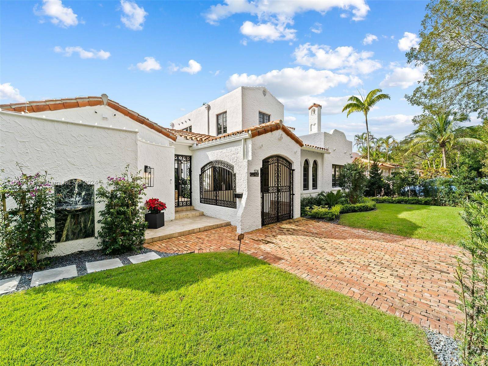 Introducing 1236 Obispo Ave, a luxurious haven nestled in the heart of Coral Gables.