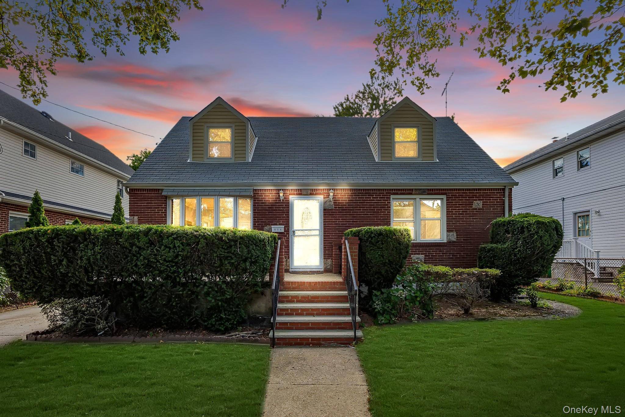 Welcome home to this updated cape in New Hyde Park.