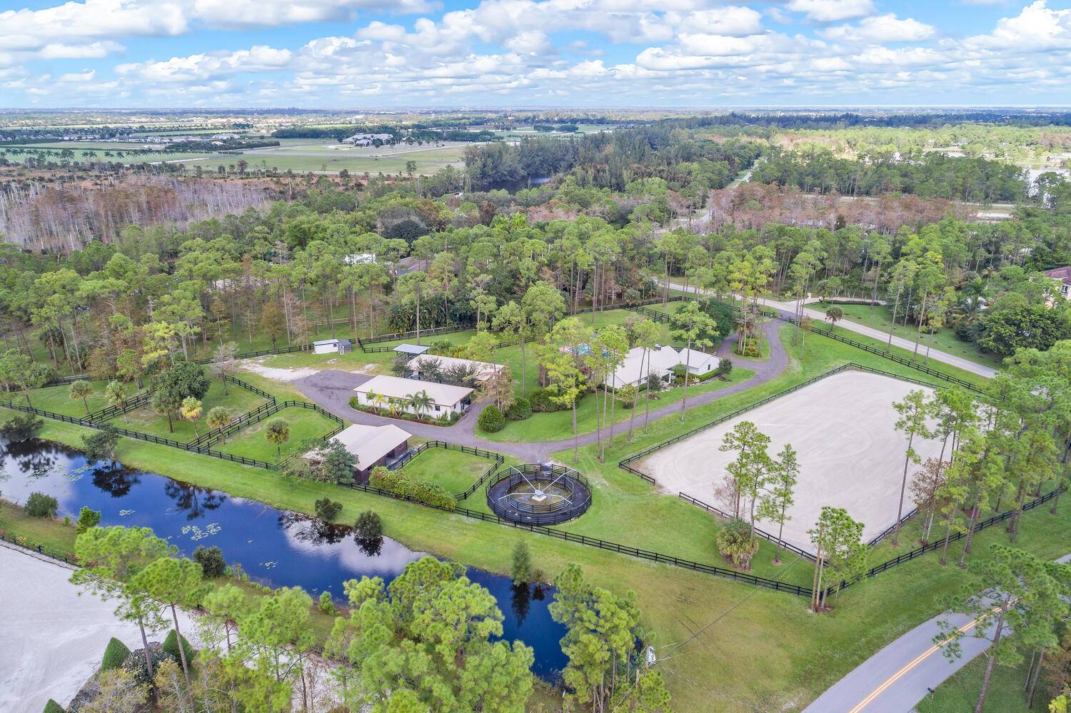 Beautiful 5 acre equestrian property located within the thriving Homeland Community in Wellington.