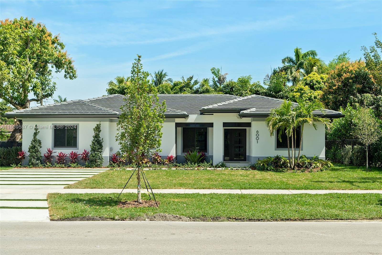 Indulge in luxury living at its finest in this newly constructed South Miami haven !