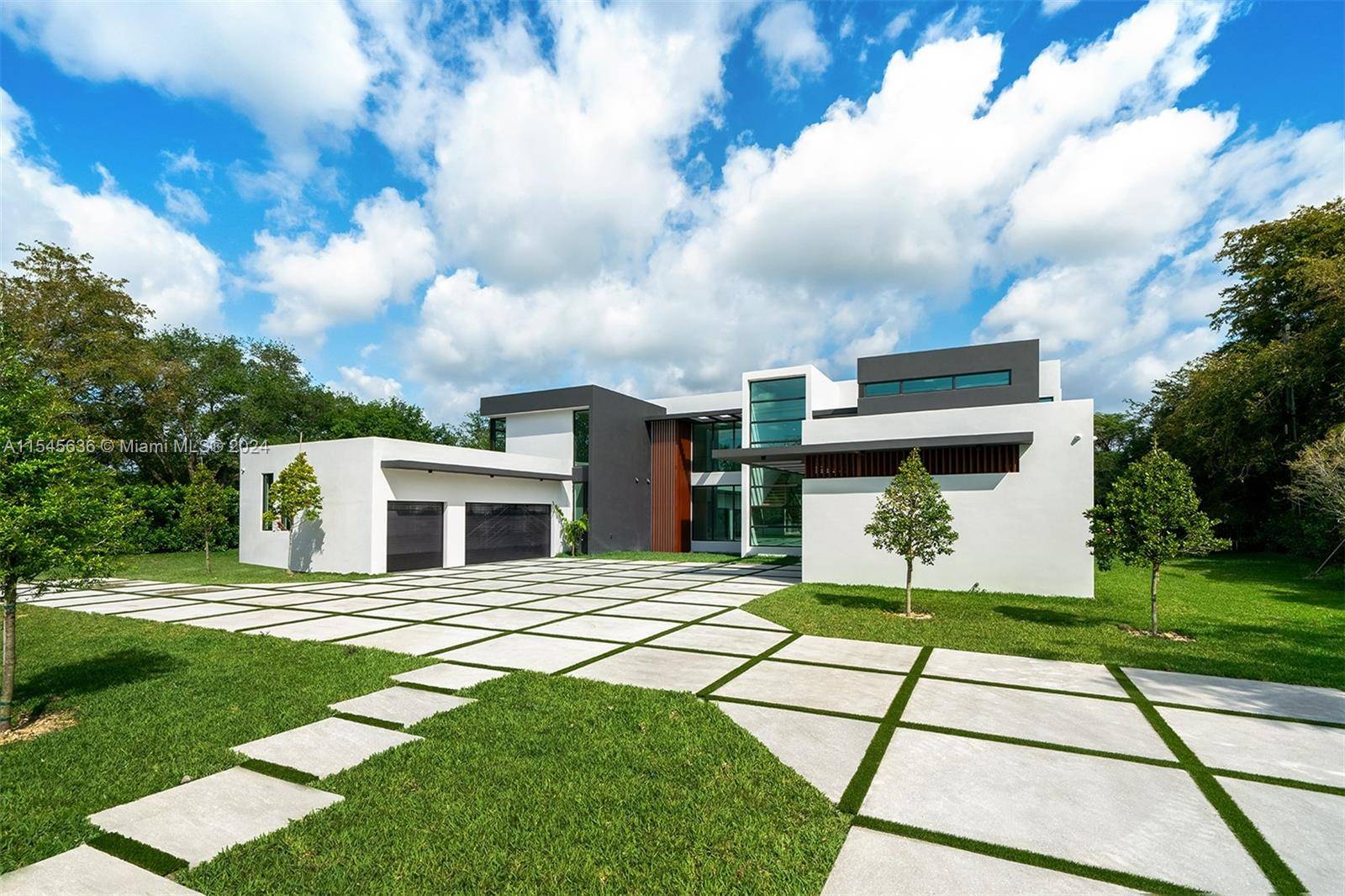 Embrace modern elegance in this 2 story luxury home on nearly an acre, ready for immediate occupancy.
