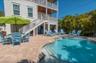 Pool area with lounging area