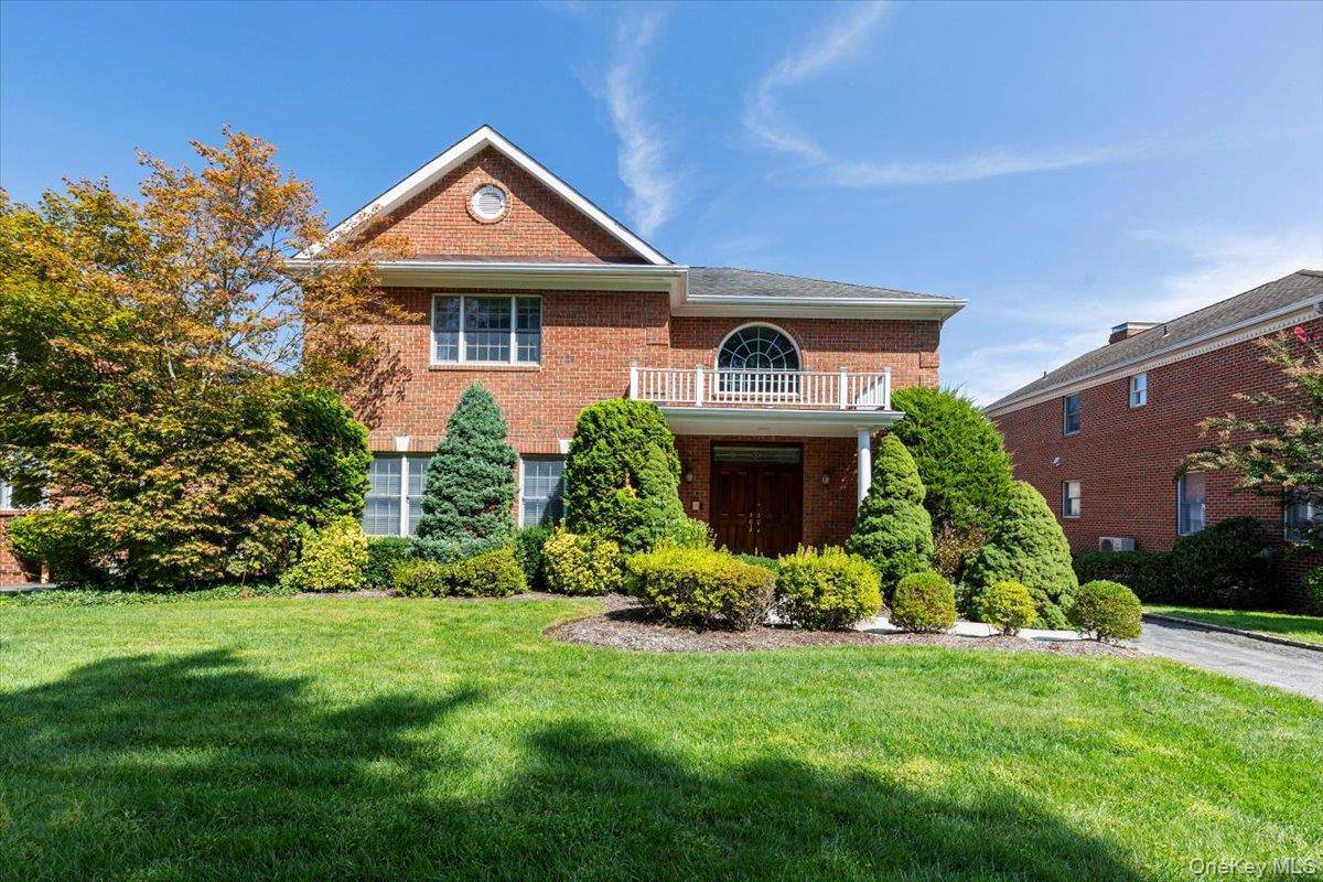 Welcome to 3 D Alessio Court a beautiful all brick Colonial home that perfectly blends modern convenience with timeless comfort.