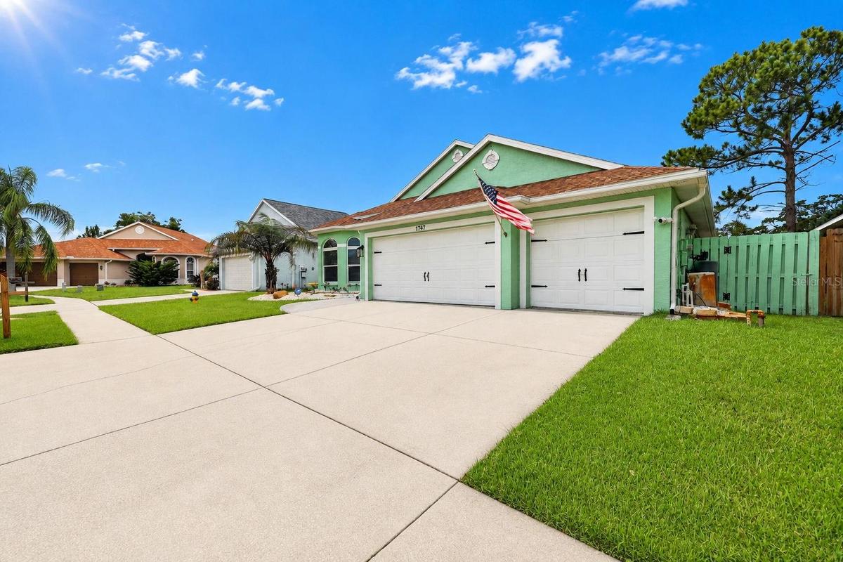 Large 3 car garage and plenty of parking