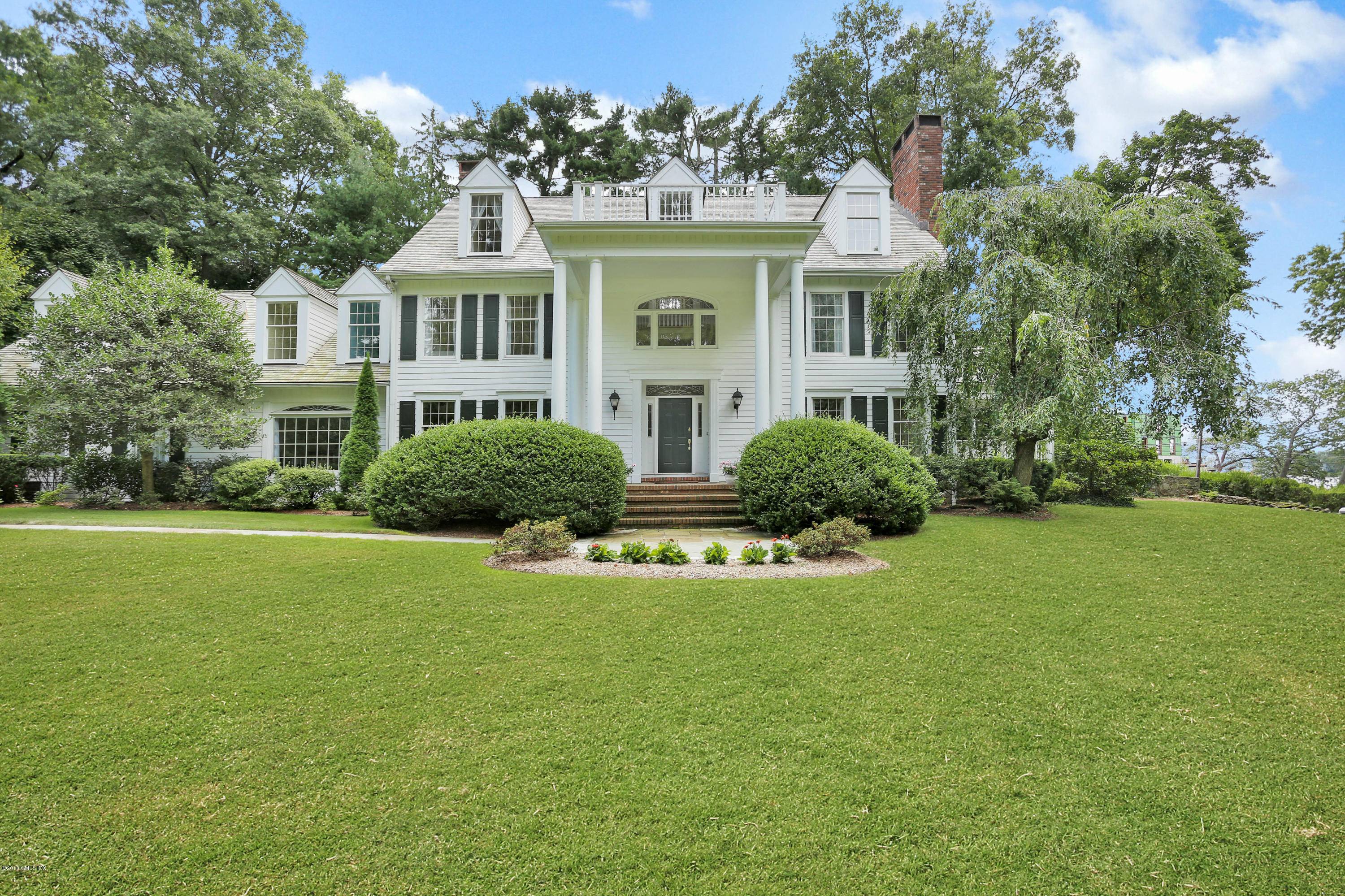 Belle Haven Association Stately, updated six bedroom colonial with tranquil water views graces one private acre on a quiet lane in the coveted enclave of Belle Haven surrounded by Greenwich's ...