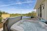 Balcony with a hot tub