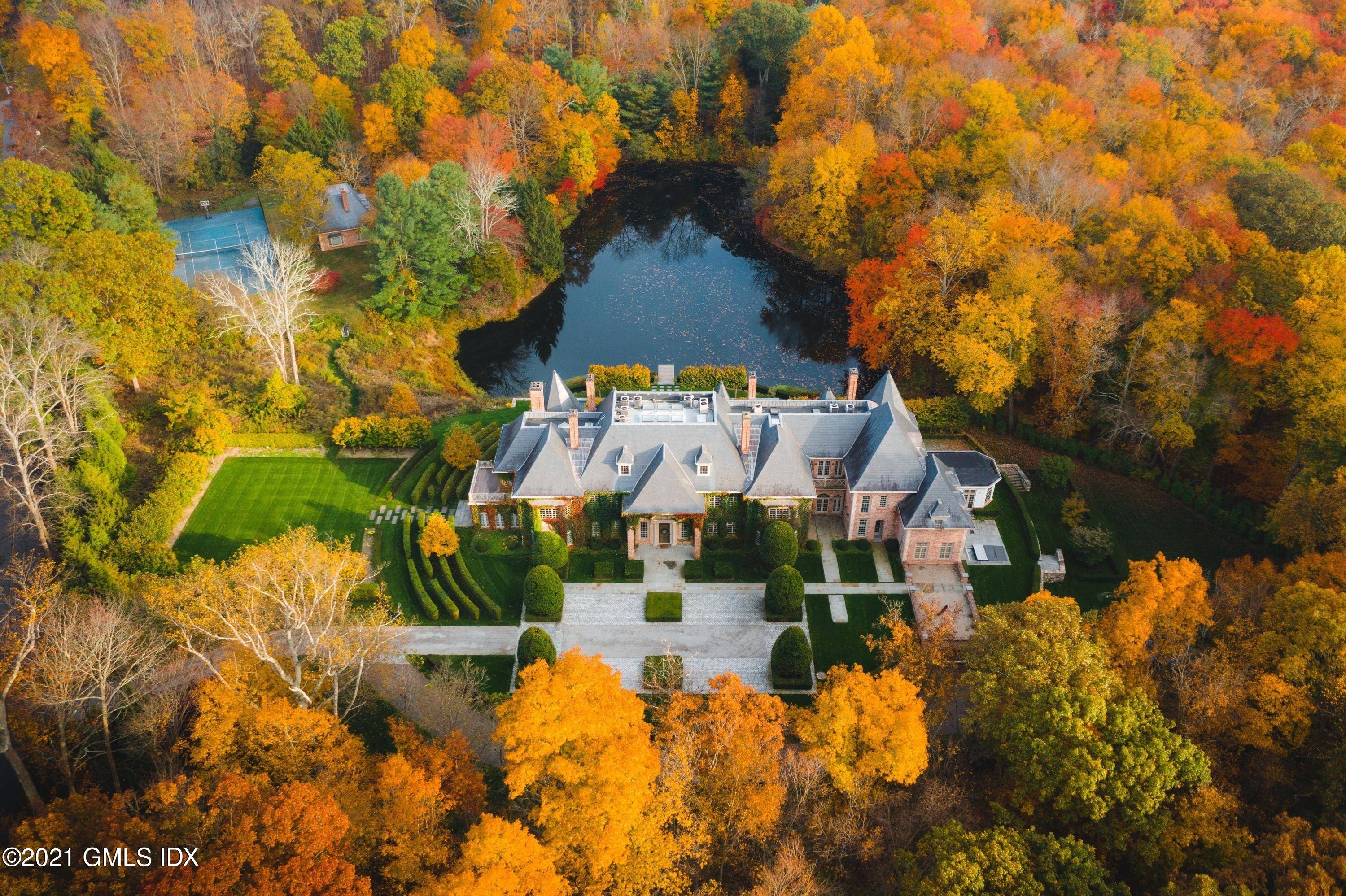 European style brick chateau offering 18, 000 SF sits on 6 acres in a superb location once chosen by Eliot Noyes.