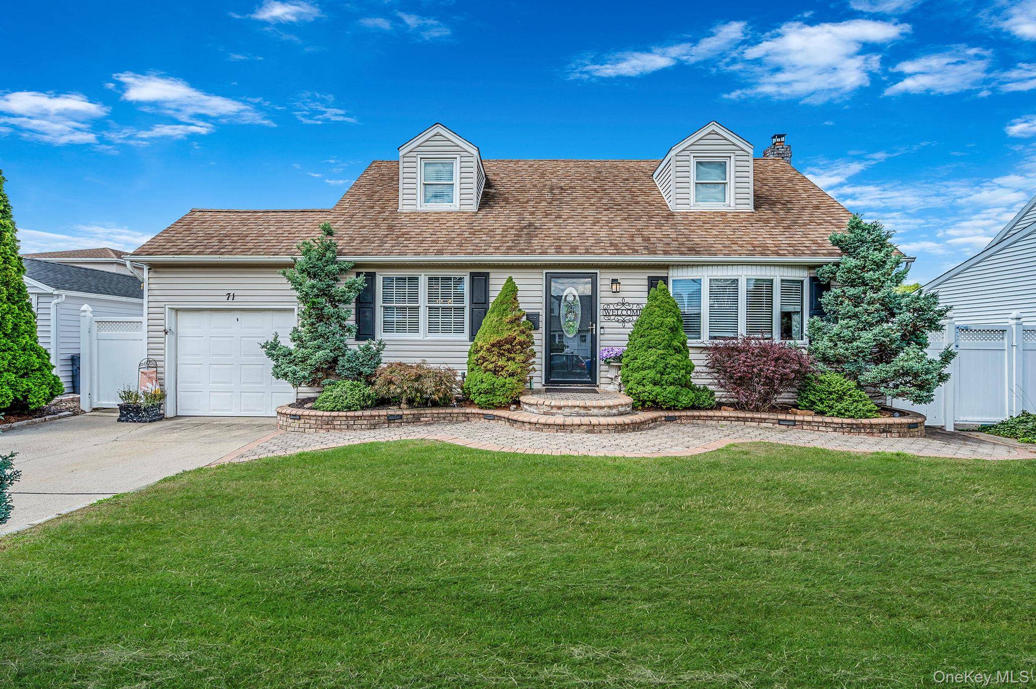 Welcome To This Beautifully Maintained 3 Bedroom, 3 Bath Expanded Cape Offering The Perfect Blend of Comfort and Functionality.