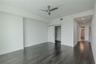 This inviting second bedroom features rich hardwood floors, recessed lighting, and a sleek ceiling fan that adds a touch of modern style. A sliding ba