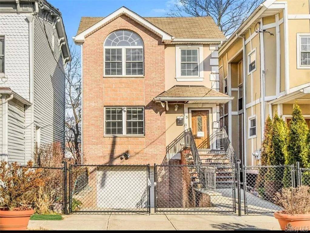 FULLY DETACHED 2 FAMILY BRICK MASONRY HOUSE SITUATED IN A QUIET TREELINE STREET OF SOUTH 7TH AVE, NEIGHBORHOOD OF MT VERNON.