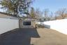 Fenced backyard featuring a patio