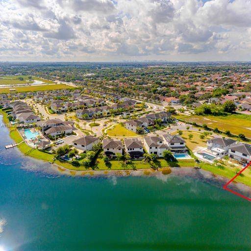 Beautiful lake front home in sought after Miami lakes gated community of Satori, with amazing club house with fitness center, children's playground and pool, 24 hour security.