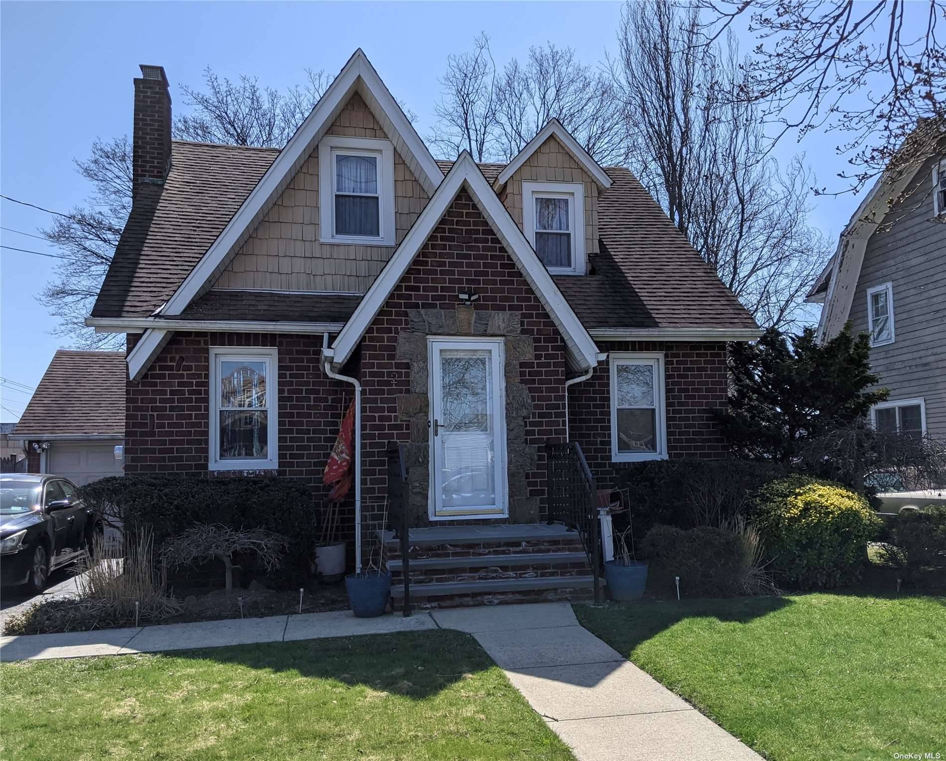 Charming 3 bedroom colonial with entry foyer, hardwood floors, FDR, L R with wood burning fireplace, den office, EIK with pantry, full, finished basement w ceramic tile floors.