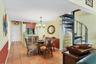 Tommy Bahama Inspired Dining Area with Spiral Stairway to Upstairs Loft & Living Quarters.