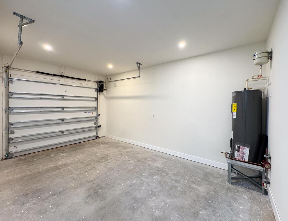 (as of April 8, 2026) Over-sized one-car garage. Side-mounted garage motor. Equipped with 220V electric vehicle plug