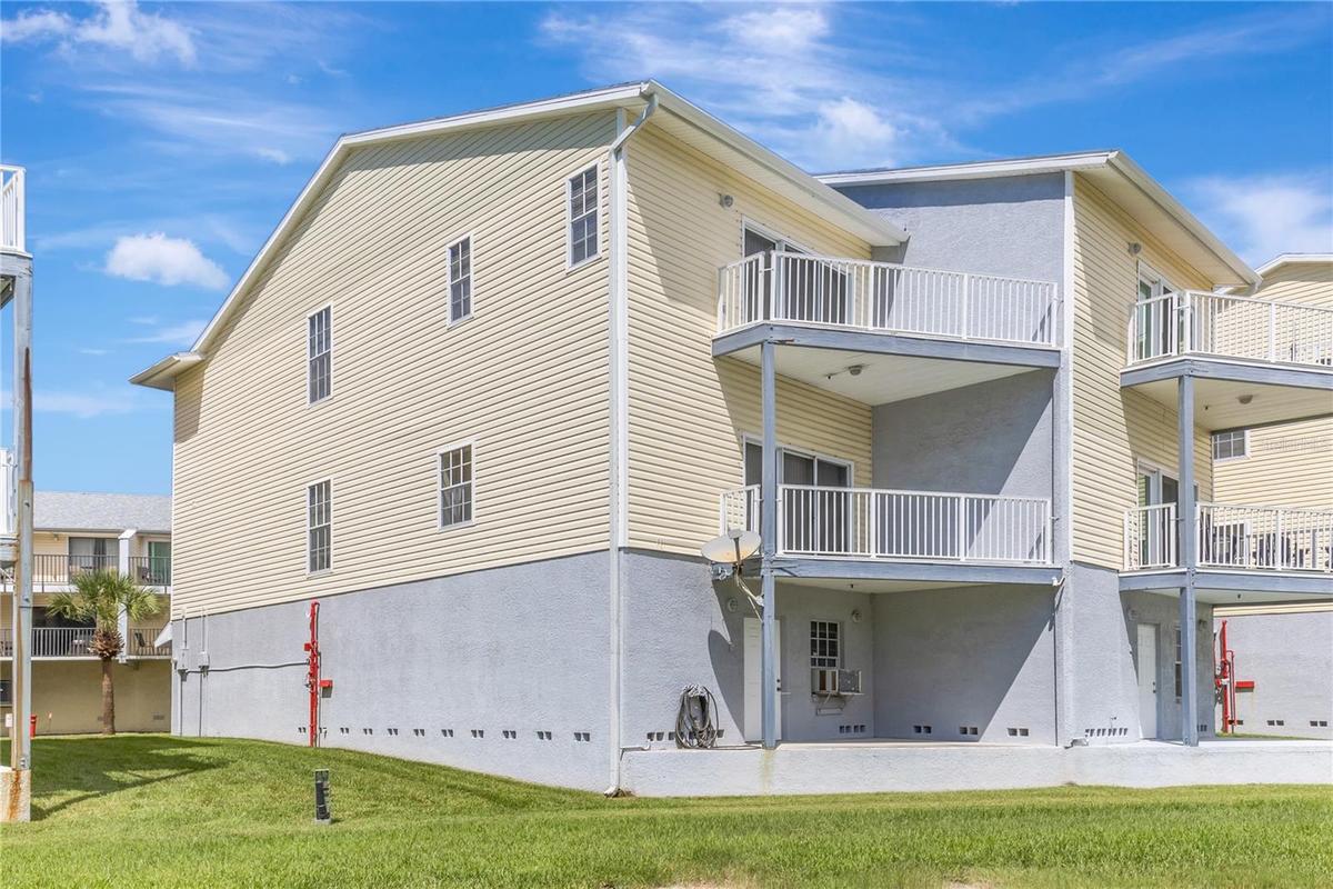 Rare end-unit townhome with water views and direct beach access just steps away.