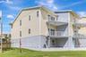 Rare end-unit townhome with water views and direct beach access just steps away.