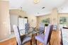 The separate Dining Room is tucked just off the foyer and features a CHARMING ARCHED front-facing window.