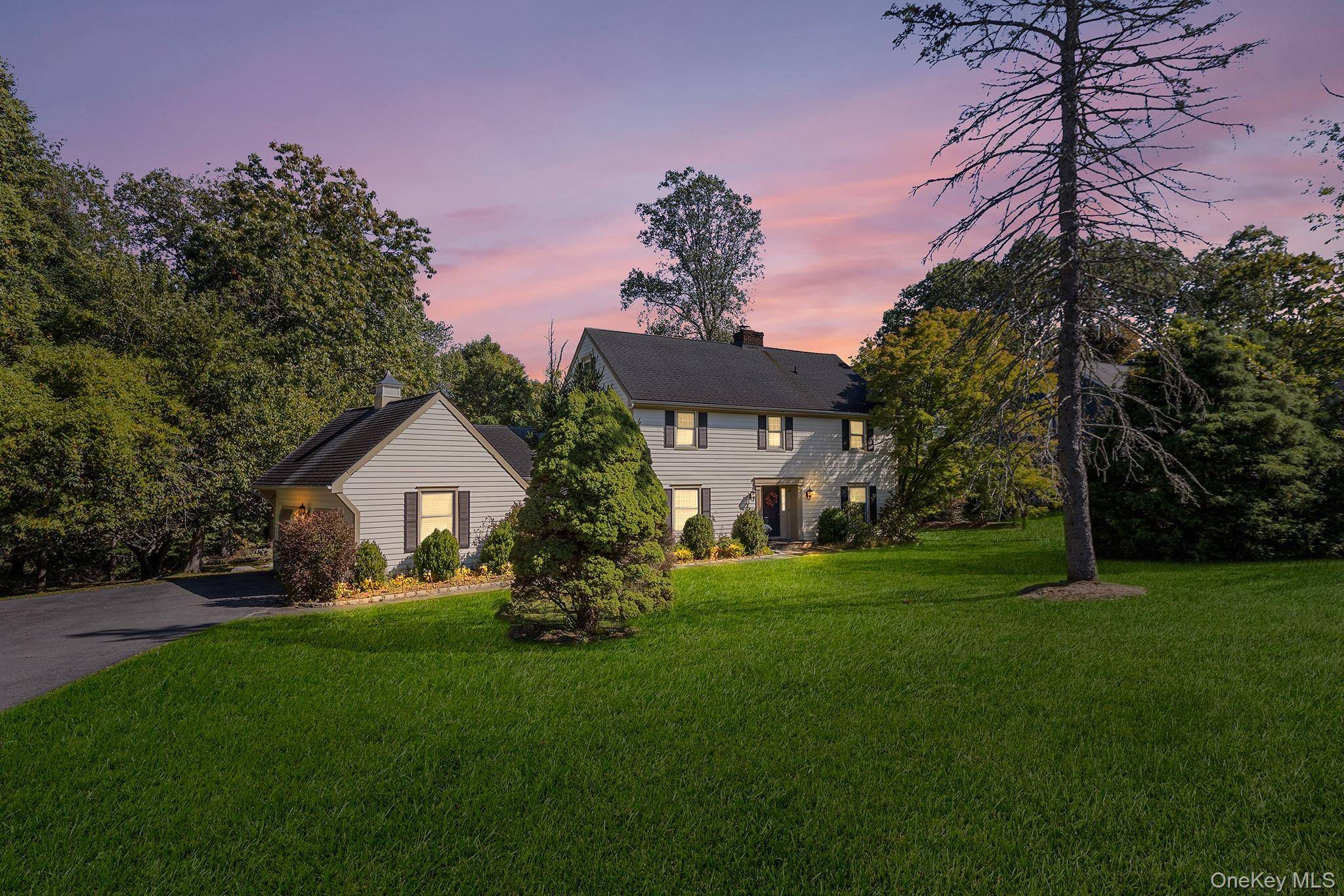 Welcome to this beautifully maintained home featuring a spacious 476 sq ft sunroom with direct access from both the living room and family room ideal for year round enjoyment.