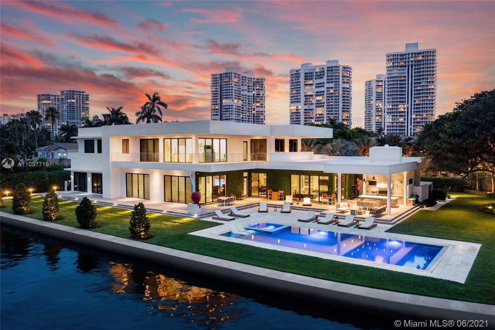 This modern tropical oasis is situated on an expansive 36, 136 SF lot, one of the largest in Golden Beach.