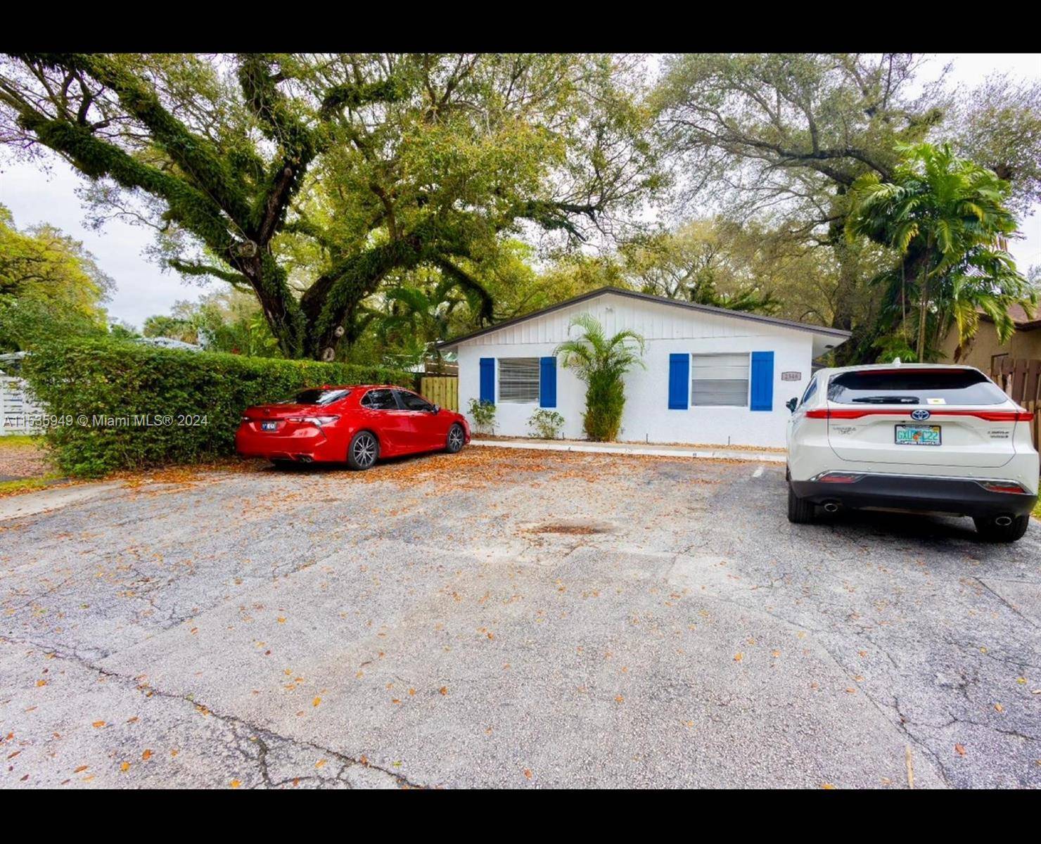 COMPLETELY RENOVATED. Great investment opportunity or live in one and rent other apartment, 3 2 and 2 1 duplex among beautiful large oak trees with large back yard and shed.