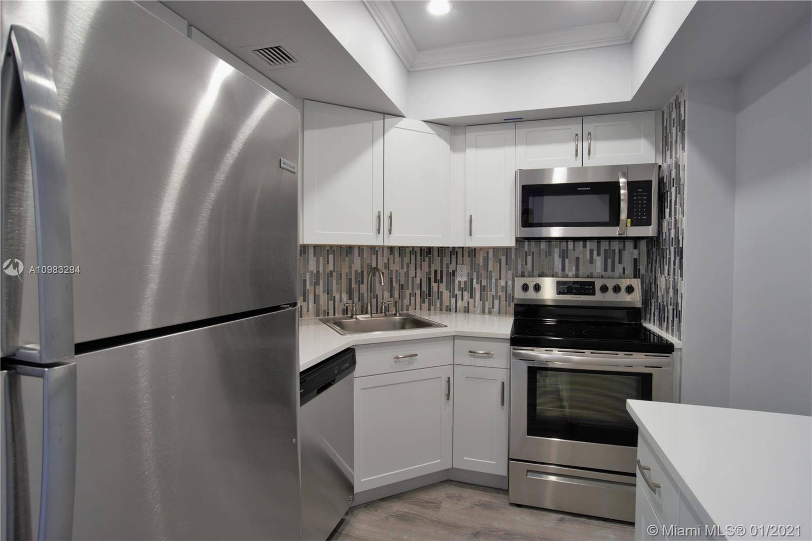 Walk to downtown Mizner Park area from this brand new renovated condo.