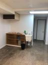 Basement featuring baseboards
