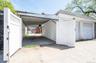 Gated Rear Entrance to Carport